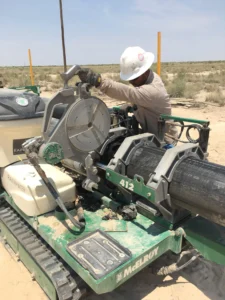 worker on an hdpe pipeline construction projec